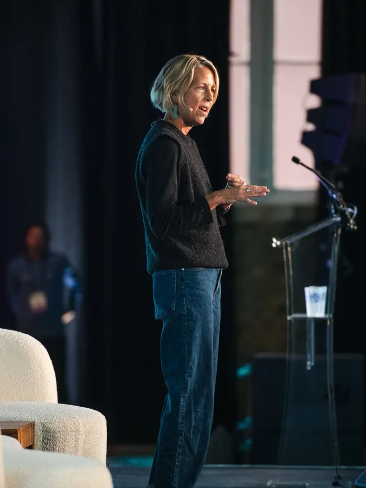 Kate Williams, CEO of 1% for the Planet, speaking on stage
